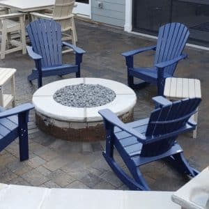 Outdoor paved backyard fire pit area